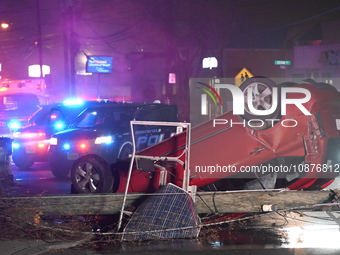 A vehicle is overturning and crashing into a pole in Bergenfield, New Jersey, United States, on December 27, 2023. The vehicle is overturnin...