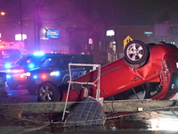 A vehicle is overturning and crashing into a pole in Bergenfield, New Jersey, United States, on December 27, 2023. The vehicle is overturnin...