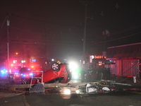 A vehicle is overturning and crashing into a pole in Bergenfield, New Jersey, United States, on December 27, 2023. The vehicle is overturnin...