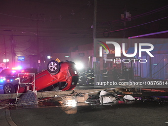 A vehicle is overturning and crashing into a pole in Bergenfield, New Jersey, United States, on December 27, 2023. The vehicle is overturnin...