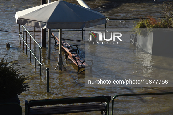 Benches are submerged on the embankment of the Danube as a wave of floods is expected on the river, in Budapest, Hungary, on December 28, 20...