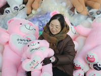 Workers are processing plush toys for export at a toy factory in Lianyungang City, East China's Jiangsu Province, on December 28, 2023. (