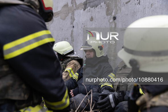 Firefighters are tackling blazes and people are taking shelter in Kharkiv after a massive Russian attack on areas across Ukraine, on Decembe...