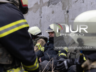 Firefighters are tackling blazes and people are taking shelter in Kharkiv after a massive Russian attack on areas across Ukraine, on Decembe...