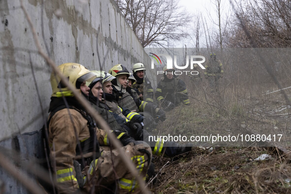 Firefighters are tackling blazes and people are taking shelter in Kharkiv after a massive Russian attack on areas across Ukraine, on Decembe...