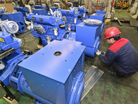 A worker is assembling a generator at a manufacturing enterprise in Qingzhou, East China's Shandong province, on December 31, 2023. (