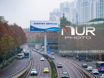 A public service advertisement for China's medical security is being displayed in Chongqing, China, on January 2, 2024. (