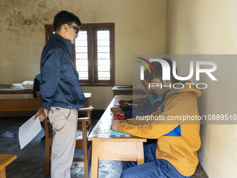 Visually impaired students are writing using the Braille system at Guwahati Blind High School in Guwahati, Assam, India, on January 4, 2024....