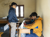 Visually impaired students are writing using the Braille system at Guwahati Blind High School in Guwahati, Assam, India, on January 4, 2024....