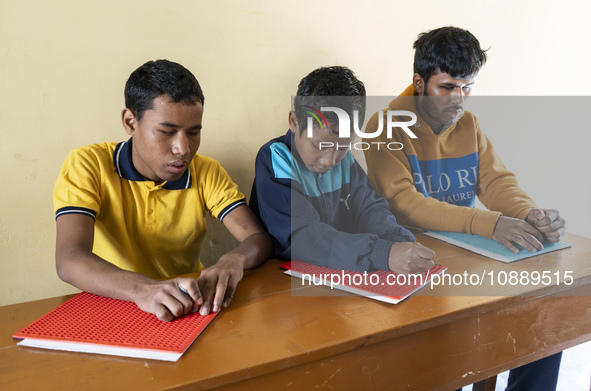 Visually impaired students are writing using the Braille system at Guwahati Blind High School in Guwahati, Assam, India, on January 4, 2024....