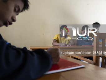 Visually impaired students are writing using the Braille system at Guwahati Blind High School in Guwahati, Assam, India, on January 4, 2024....