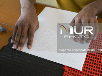 Visually impaired students are reading using the Braille system at Guwahati Blind High School in Guwahati, Assam, India, on January 4, 2024....