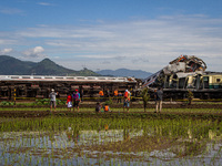 Search and rescue teams are searching for and evacuating victims after the Bandung Raya local train collided with the Turangga train in Cica...