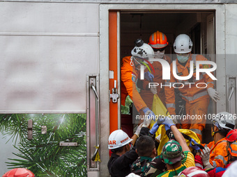 Search and rescue teams are evacuating after the Bandung Raya local train collided with the Turangga train in Cicalengka, Bandung Regency, W...