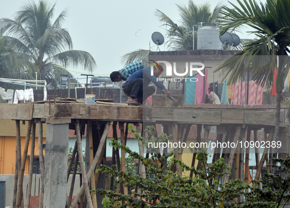 Workers Work At An Under Construction Site In Siliguri On Wednesday, Jan 10,2024. 