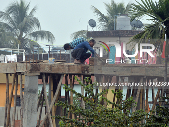 Workers Work At An Under Construction Site In Siliguri On Wednesday, Jan 10,2024. (