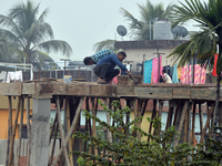 Workers Work At An Under Construction Site In Siliguri On Wednesday, Jan 10,2024. (