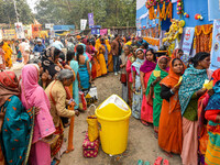 Devotees are queuing outside a free eye checkup camp at the Gangasagar transit camp in Kolkata, India, on January 11, 2024. (