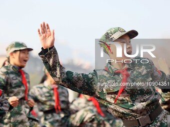 Children are demonstrating military boxing during a national defense education class at Bengbu Road No. 3 Primary School in Hefei, East Chin...