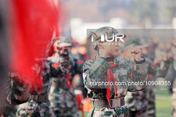 Children are demonstrating military boxing during a national defense education class at Bengbu Road No. 3 Primary School in Hefei, East Chin...