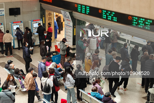 Many patients are waiting in the outpatient hall of a hospital in Shanghai, China, on January 11, 2024. 