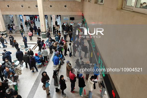 Many patients are waiting in the outpatient hall of a hospital in Shanghai, China, on January 11, 2024. 