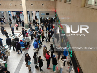 Many patients are waiting in the outpatient hall of a hospital in Shanghai, China, on January 11, 2024. (