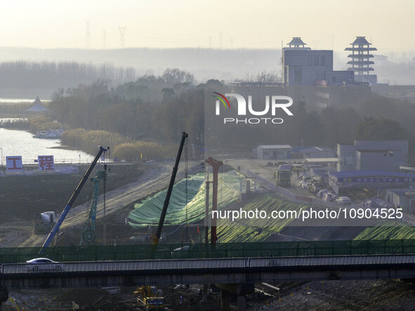 Workers are working at the construction site of the Yundong Gate rescue and reinforcement project east of the intersection of the Subei Irri...