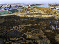 Workers are working at the construction site of the Yundong Gate rescue and reinforcement project east of the intersection of the Subei Irri...