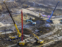 Workers are working at the construction site of the Yundong Gate rescue and reinforcement project east of the intersection of the Subei Irri...