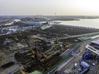 Workers are working at the construction site of the Yundong Gate rescue and reinforcement project east of the intersection of the Subei Irri...