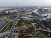 Workers are working at the construction site of the Yundong Gate rescue and reinforcement project east of the intersection of the Subei Irri...