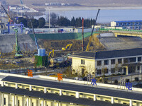 Workers are working at the construction site of the Yundong Gate rescue and reinforcement project east of the intersection of the Subei Irri...