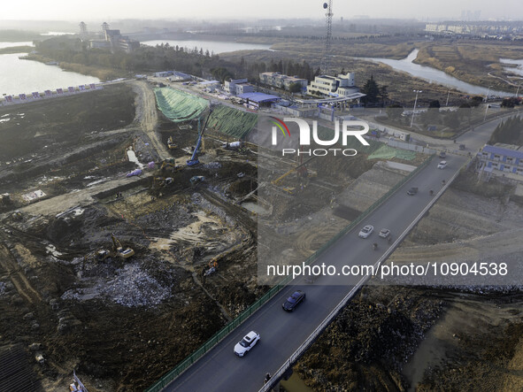 Workers are working at the construction site of the Yundong Gate rescue and reinforcement project east of the intersection of the Subei Irri...