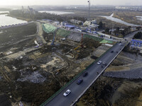 Workers are working at the construction site of the Yundong Gate rescue and reinforcement project east of the intersection of the Subei Irri...