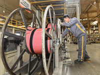 A worker is working on the production line of a tire manufacturing company in the Qingzhou Economic Development Zone, in Qingzhou, China, on...