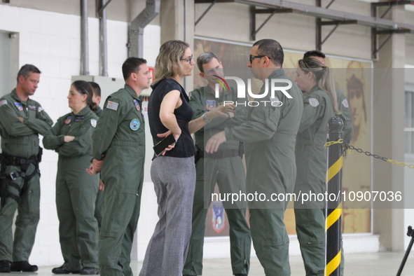 Military police are moving in the hangar of the air group in Sao Paulo, Brazil, on January 12, 2024, after finding the helicopter that went...