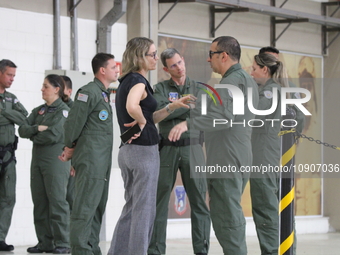 Military police are moving in the hangar of the air group in Sao Paulo, Brazil, on January 12, 2024, after finding the helicopter that went...