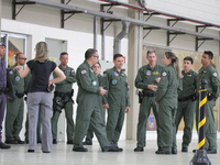 Military police are moving in the hangar of the air group in Sao Paulo, Brazil, on January 12, 2024, after finding the helicopter that went...