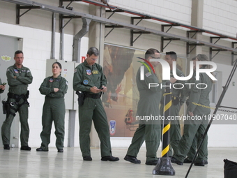 Military police are moving in the hangar of the air group in Sao Paulo, Brazil, on January 12, 2024, after finding the helicopter that went...