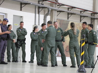 Military police are moving in the hangar of the air group in Sao Paulo, Brazil, on January 12, 2024, after finding the helicopter that went...