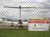 Military police are moving in the hangar of the air group in Sao Paulo, Brazil, on January 12, 2024, after finding the helicopter that went...