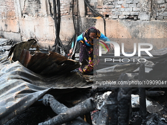 Slum-dwellers in Bangladesh were seen searching for their household belongings after a devastating fire broke out at the Karwan Bazar slum i...