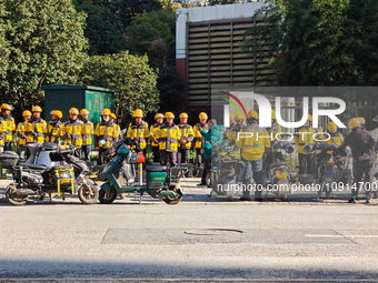 Many Meituan food delivery workers are lining up to make preparations in Shanghai, China, on January 14, 2024. (