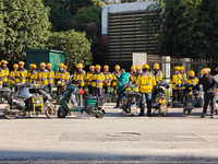 Many Meituan food delivery workers are lining up to make preparations in Shanghai, China, on January 14, 2024. (