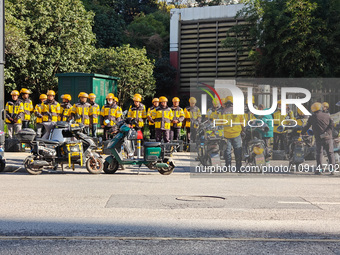 Many Meituan food delivery workers are lining up to make preparations in Shanghai, China, on January 14, 2024. (