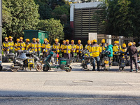 Many Meituan food delivery workers are lining up to make preparations in Shanghai, China, on January 14, 2024. (