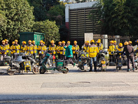 Many Meituan food delivery workers are lining up to make preparations in Shanghai, China, on January 14, 2024. (