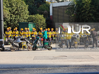 Many Meituan food delivery workers are lining up to make preparations in Shanghai, China, on January 14, 2024. (