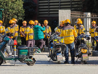 Many Meituan food delivery workers are lining up to make preparations in Shanghai, China, on January 14, 2024. (